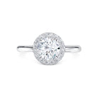 Anetta - Micheli Jewellery, diamond engagement ring with diamond halo and 4 claw setting in white gold. diamond halo engagement ring. round brilliant cut centre stone engagement ring. white gold round diamond engagement ring. diamond halo setting on engagement ring.