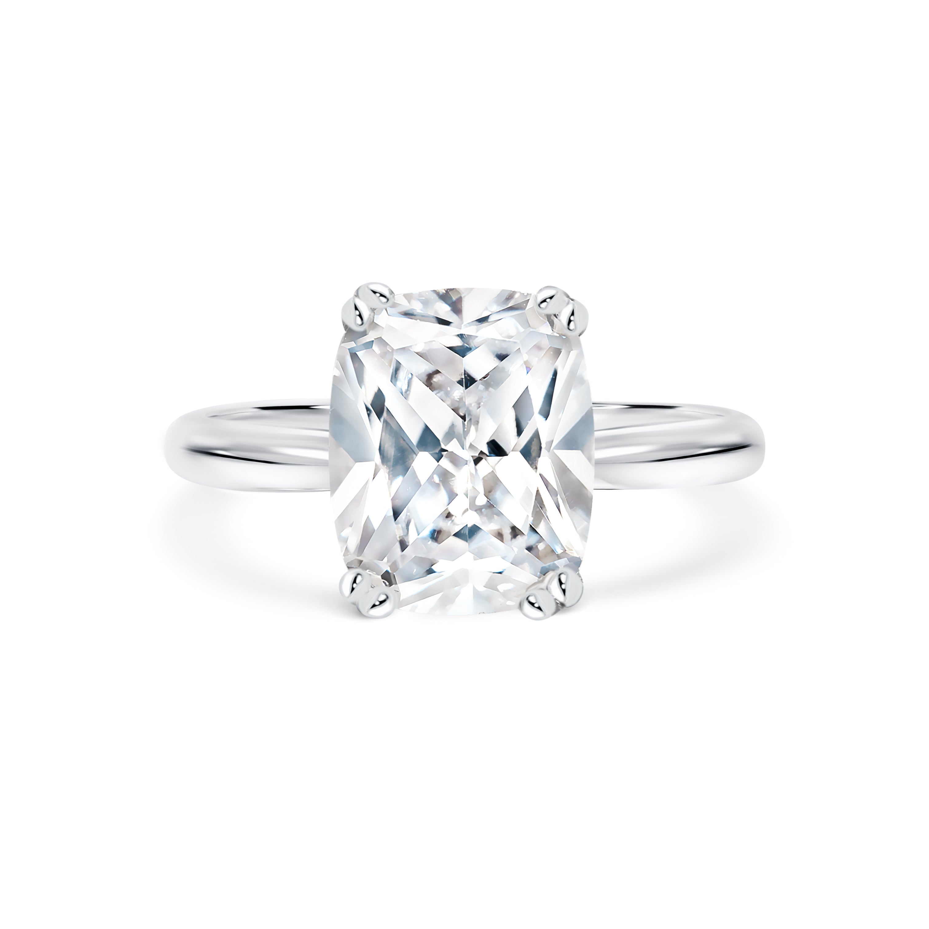 Athra - Micheli Jewellery, elongated cushion cut solitaire engagement ring with double claws. solitaire engagement ring. elongated cushion cut diamond engagement ring. white gold elongated cushion cut engagement ring.