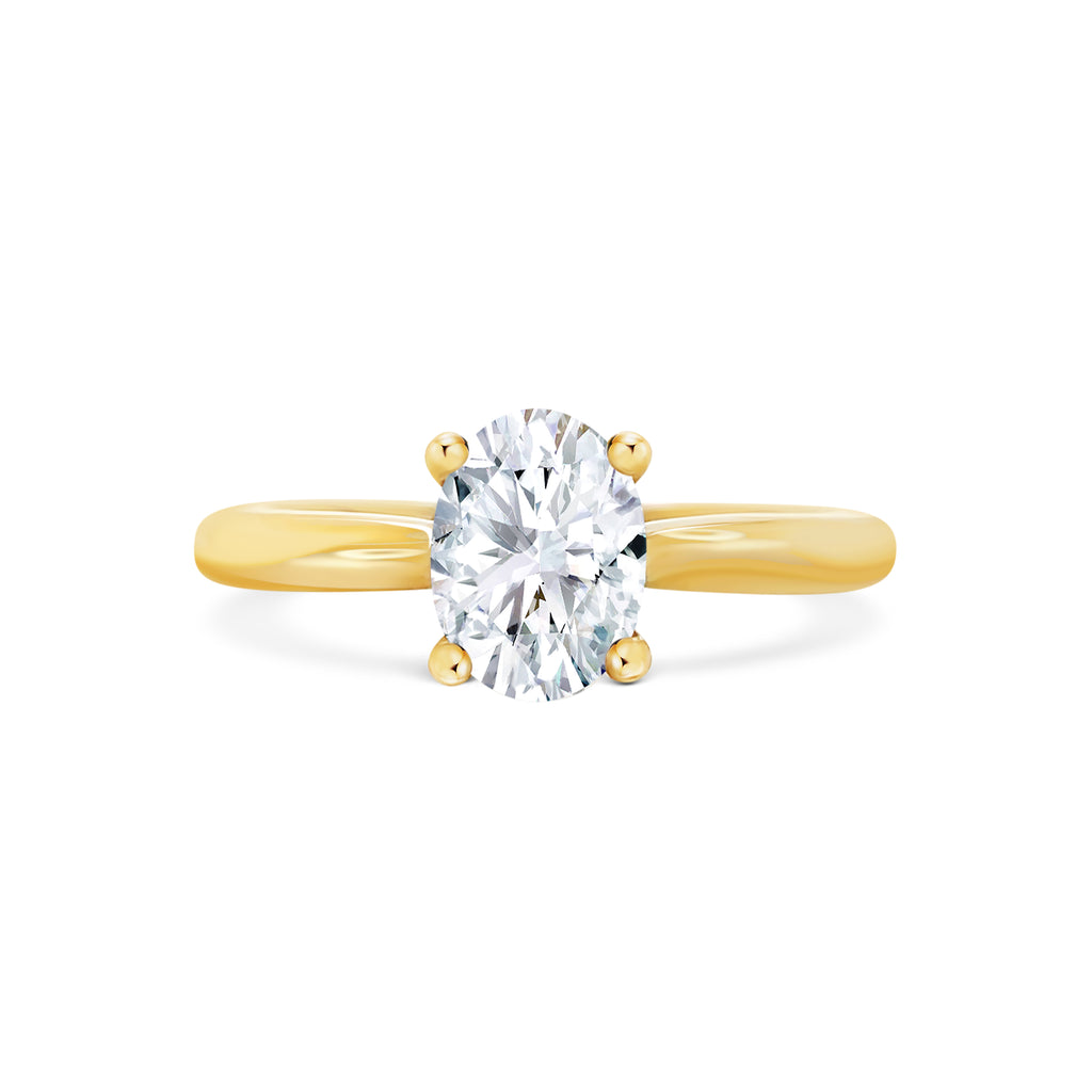 Micheli Jewellery, beautiful oval diamond engagement ring in yellow gold. Oval diamond solitaire engagement ring in yellow gold. Oval diamond engagement ring with yellow gold 4 claw setting. 