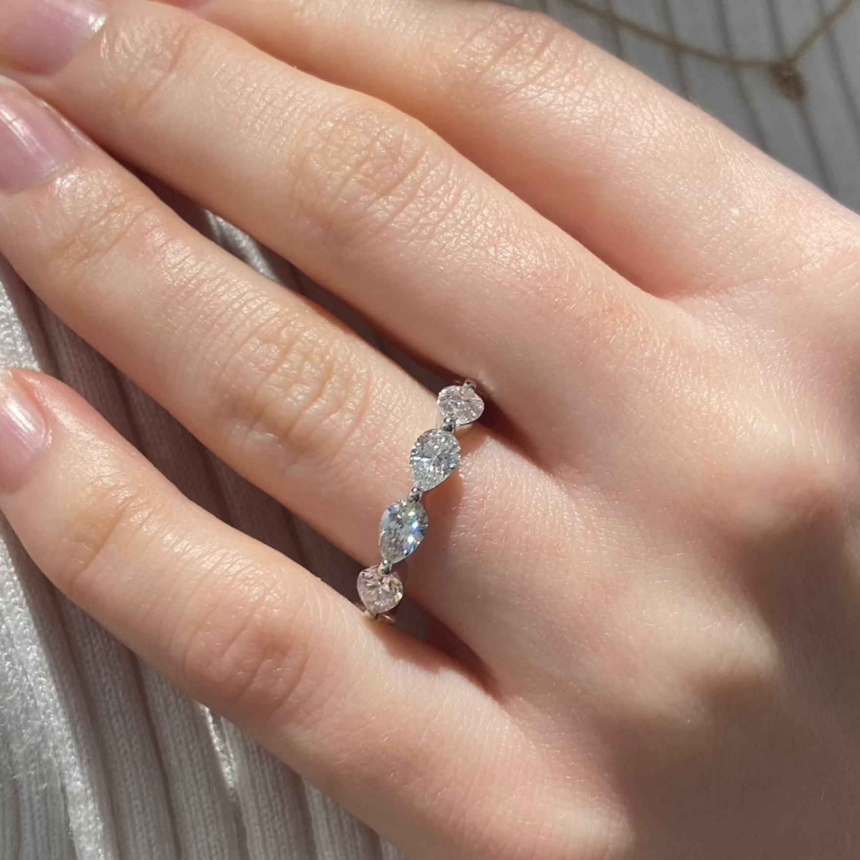 Pear diamond infinity wedding or engagement ring.