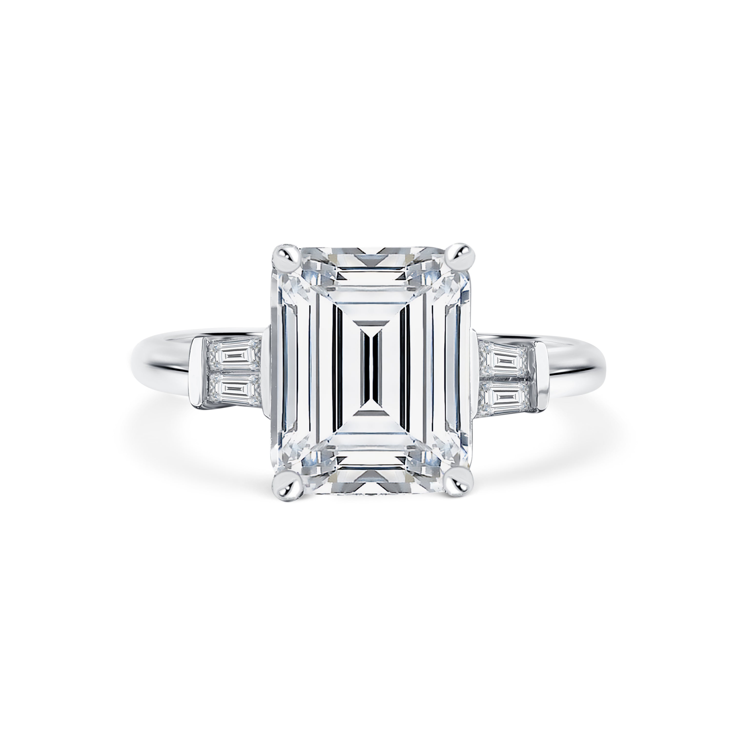 Trista - Micheli Jewellery, emerald cut diamond trilogy ring. trilogy ring profile. baguette diamond side stone ring. white gold trilogy ring. emerald cut trilogy ring. art deco styled ring. white gold 4 claw trilogy ring with emerald radiant cut diamond and baguette diamond side stones.