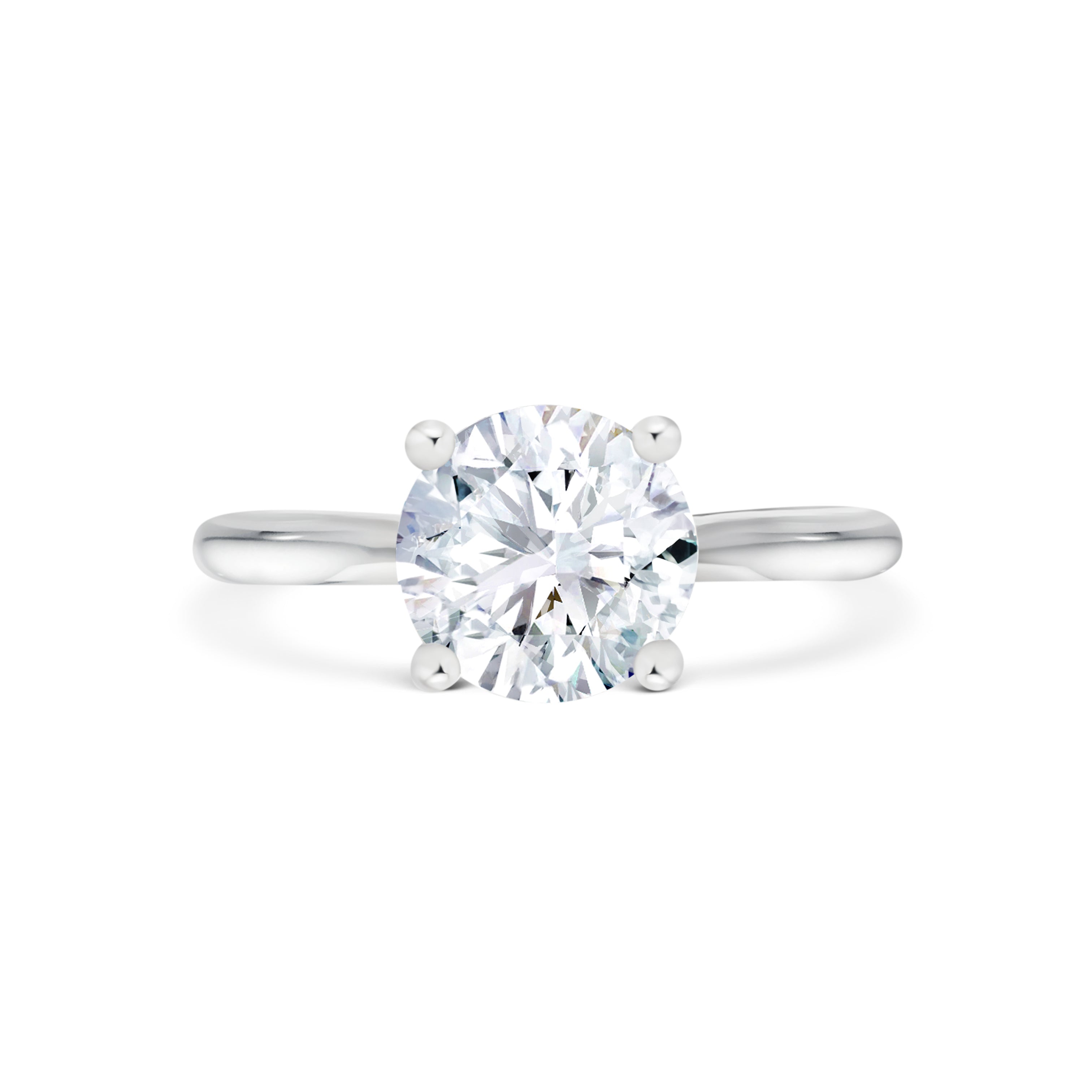 Lucca - Micheli Jewellery. Round brilliant cut diamond solitaire engagement ring in white gold. White gold engagement ring 4 prong setting. Round brilliant cut solitaire engagement ring.