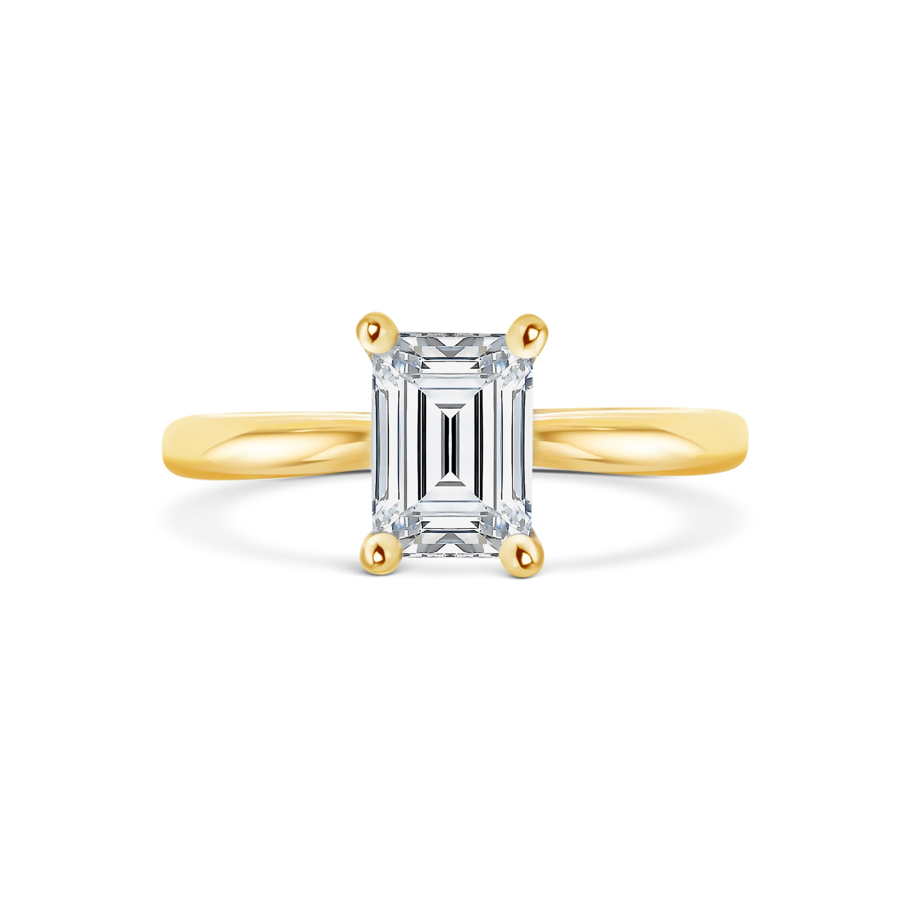 Gabriella - Micheli Jewellery. Emerald cut solitaire engagement ring in yellow gold. Yellow gold engagement ring with emerald cut diamond centre stone. Yellow gold engagement ring. Solitaire engagement ring in yellow gold with 4 prong setting. Custom made engagement rings Melbourne. Melbourne, Australia.