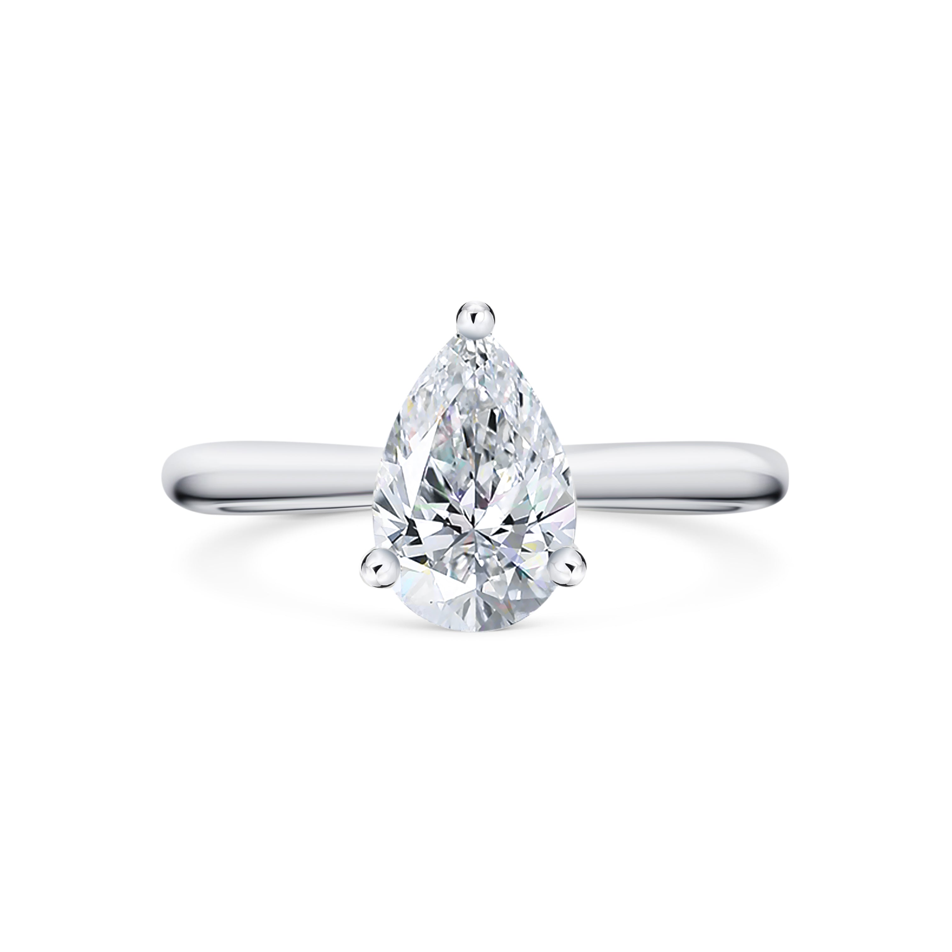 Clara - Micheli Jewellery. Pear shape diamond solitaire engagement ring. White gold band and 3 claw setting. Simple and refined pear solitaire. Pear diamond solitaire. Melbourne, Australia.