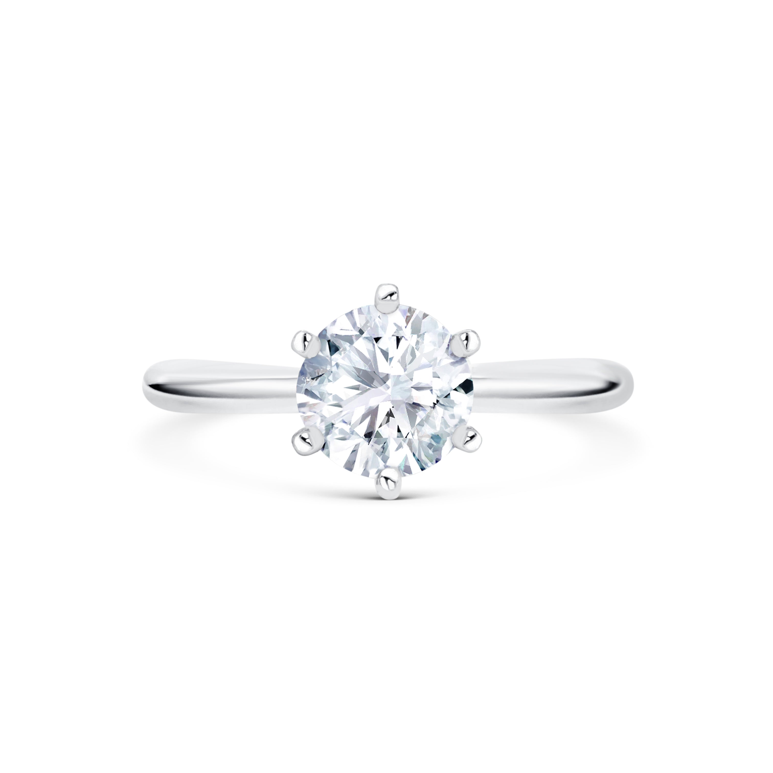 Lucia - Micheli Jewellery, white gold solitaire engagement ring with round brilliant cut diamond and 6 claw setting. white gold engagement ring. 6 claw setting engagement ring. refined design solitaire engagement ring. round diamond and white gold in engagement ring.