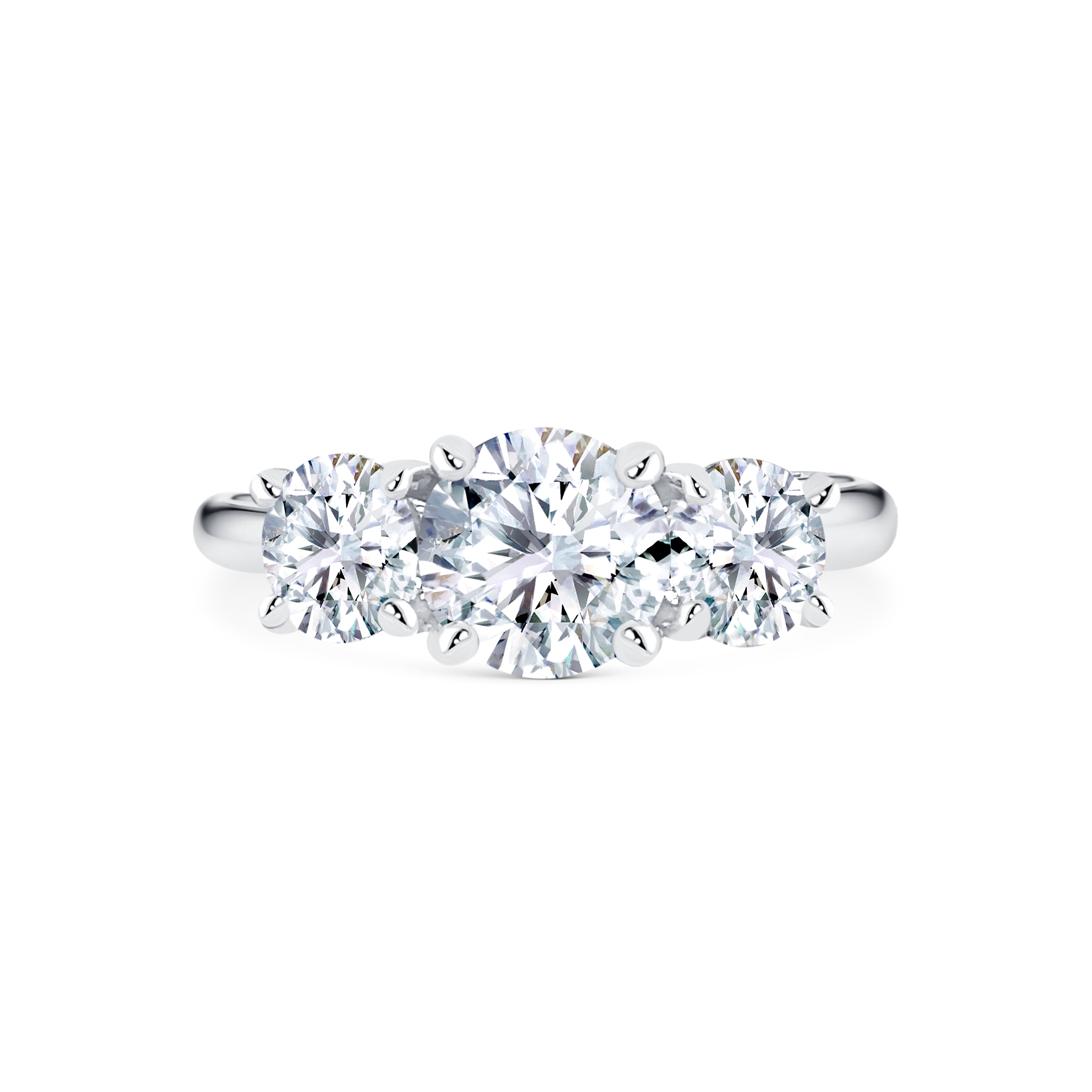 Micheli Jewellery's Trilogy engagement ring with 3 stones of round brilliant cut diamonds available in white or yellow gold