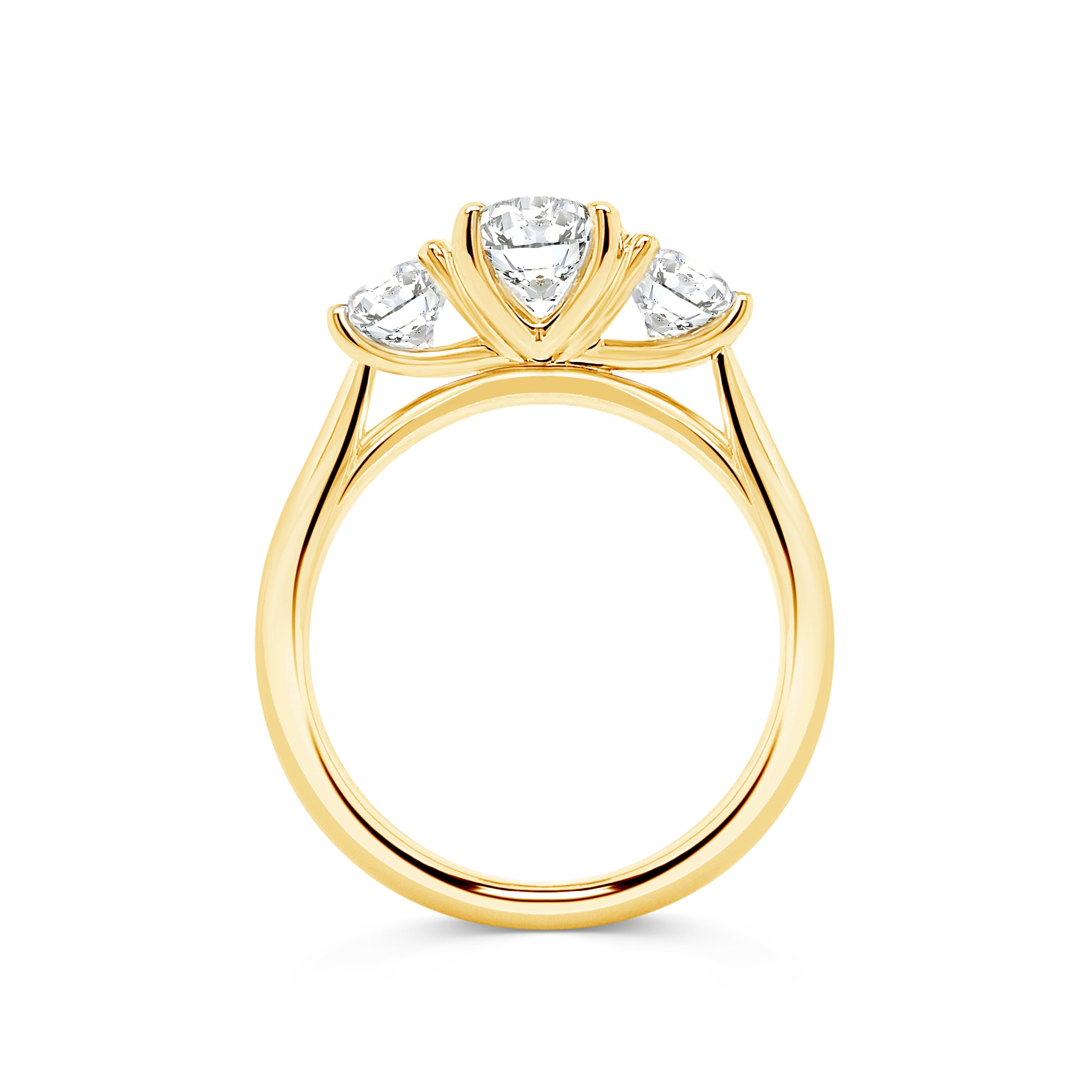 Micheli Jewellery's Trilogy engagement ring with 3 stones of round brilliant cut diamonds available in white or yellow gold