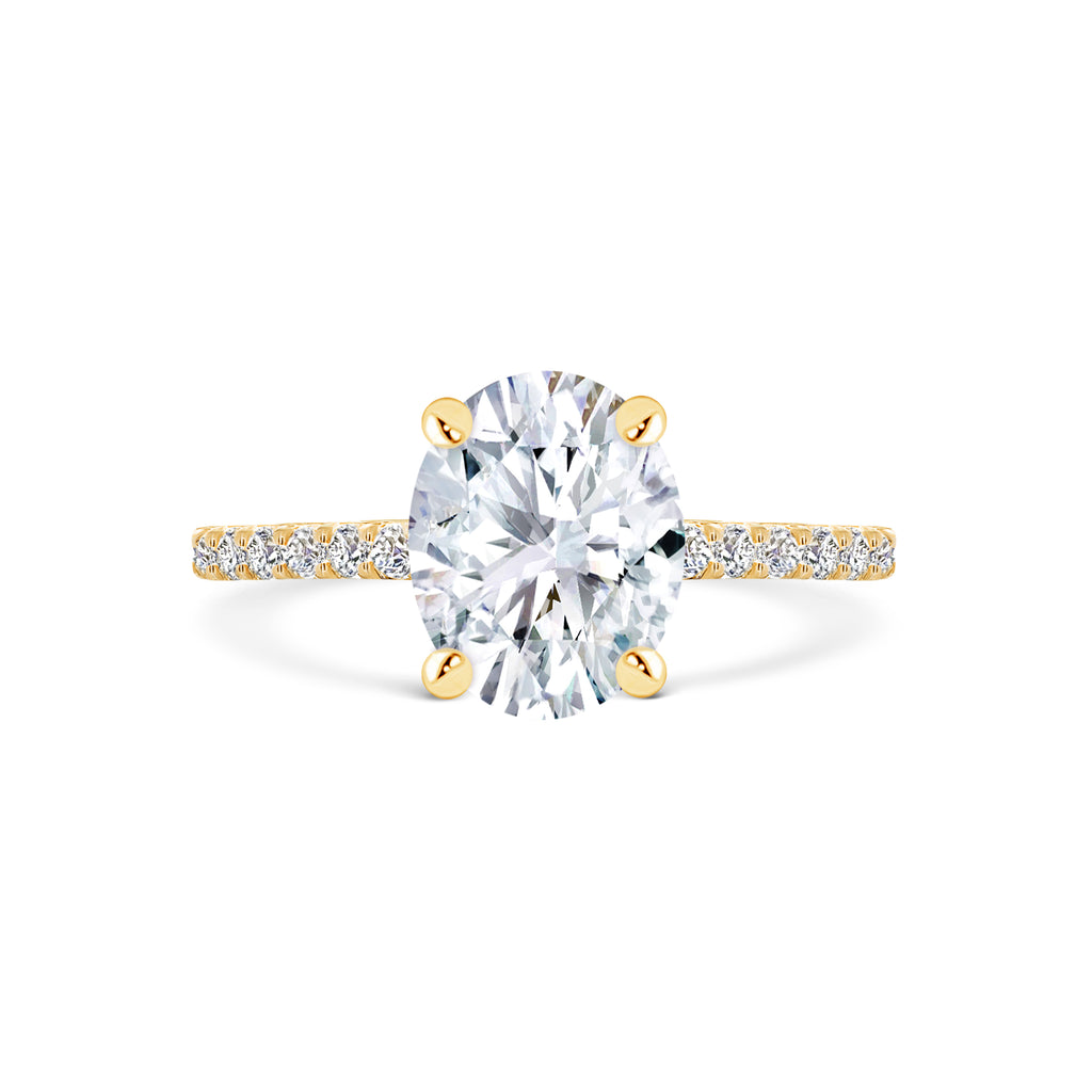 Micheli Jewellery's popular oval diamond engagement ring with hidden diamond halo & band