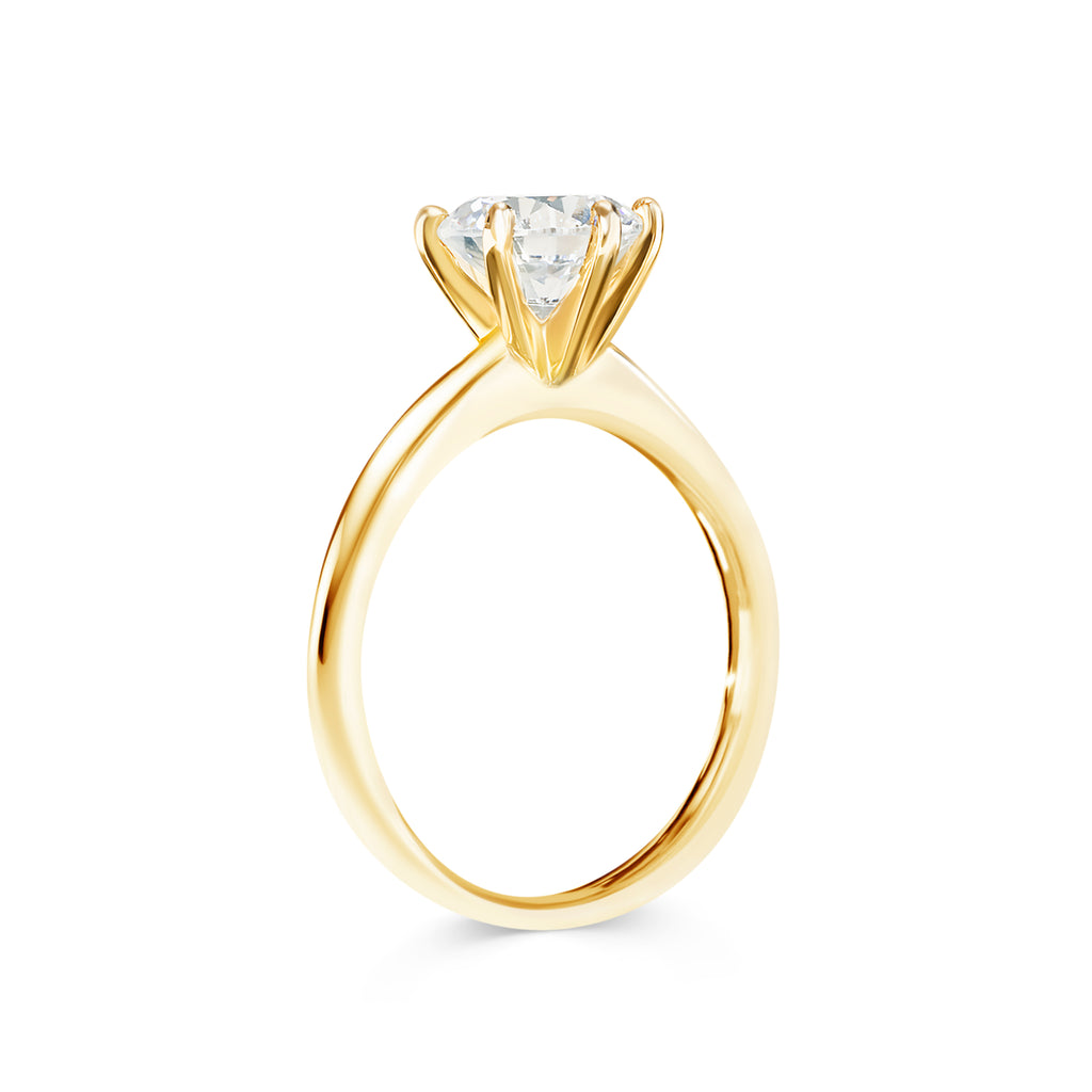 Micheli Jewellery round brilliant cut solitaire diamond engagement ring in yellow gold band. 6 claw yellow gold engagement ring side profile. solitaire engagement ring side profile. side profile of round brilliant cut diamond ring in yellow gold with 6 claw setting. 