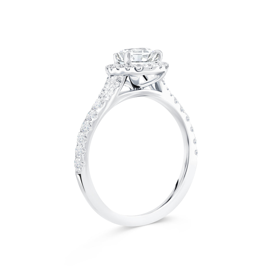 Micheli Jewellery Custom Engagement Ring with Pear tear drop diamond with a halo and diamonds on band 