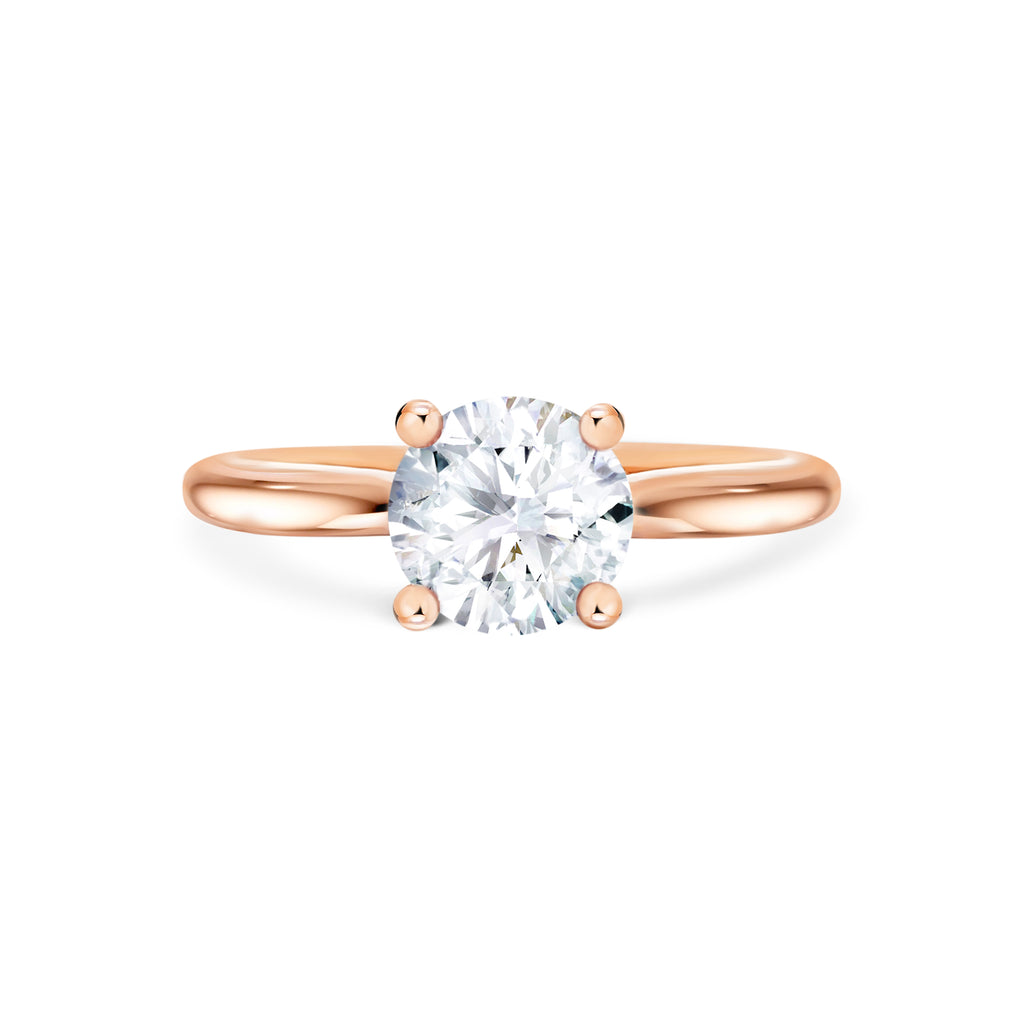 Viola - Micheli Jewellery. Rose Gold 4 claws engagement ring with round brilliant cut diamond centre stone. Solitaire engagement ring in rose gold. Round brilliant diamond engagement ring in rose gold. Solitaire round brilliant diamond. Rose gold solitaire. Simple and refined. Melbourne, Australia. 