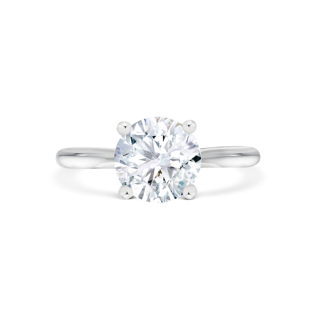 Lucca - Micheli Jewellery. Round brilliant cut diamond solitaire engagement ring in white gold. White gold engagement ring 4 prong setting. Round brilliant cut solitaire engagement ring. 
