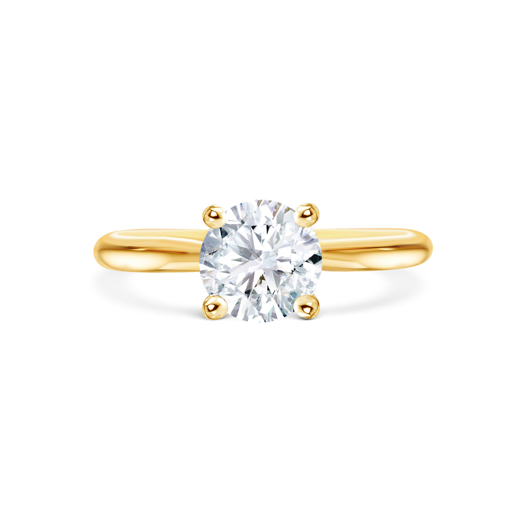 Viola - Micheli Jewellery. Yellow gold 4 claw engagement ring with round brilliant cut diamond centre stone. Round brilliant cut diamond solitaire engagement ring. 4 Claw setting engagement ring. Custom made engagement rings Melbourne, Australia.