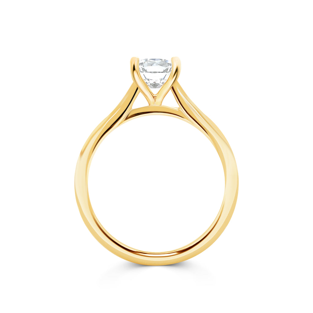 Viola - Micheli Jewellery. Round brilliant cut diamond solitaire engagement ring yellow gold with swept up shoulders. Yellow gold Round brilliant cut Diamond engagement ring. Yellow gold engagement ring. Side profile engagement ring with 4 claws in yellow gold. Melbourne, Australia. 