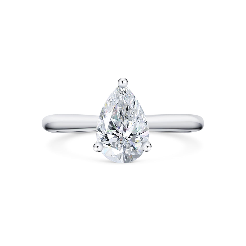 Clara - Micheli Jewellery. Pear shape diamond solitaire engagement ring. White gold band and 3 claw setting. Simple and refined pear solitaire. Pear diamond solitaire. Melbourne, Australia. 