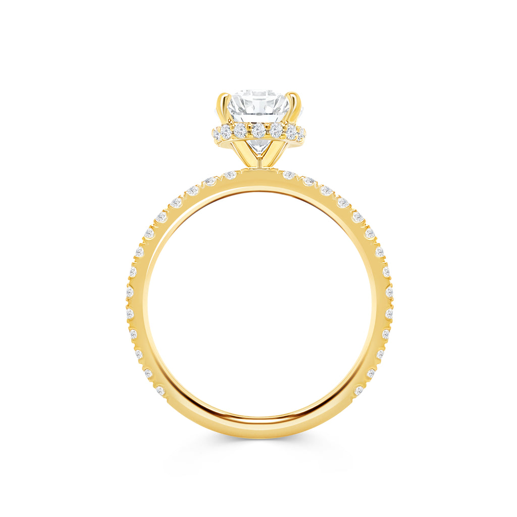 Micheli Jewellery's Carla Engagement Ring with Oval cut diamond, a hidden diamond halo and band in yellow gold.