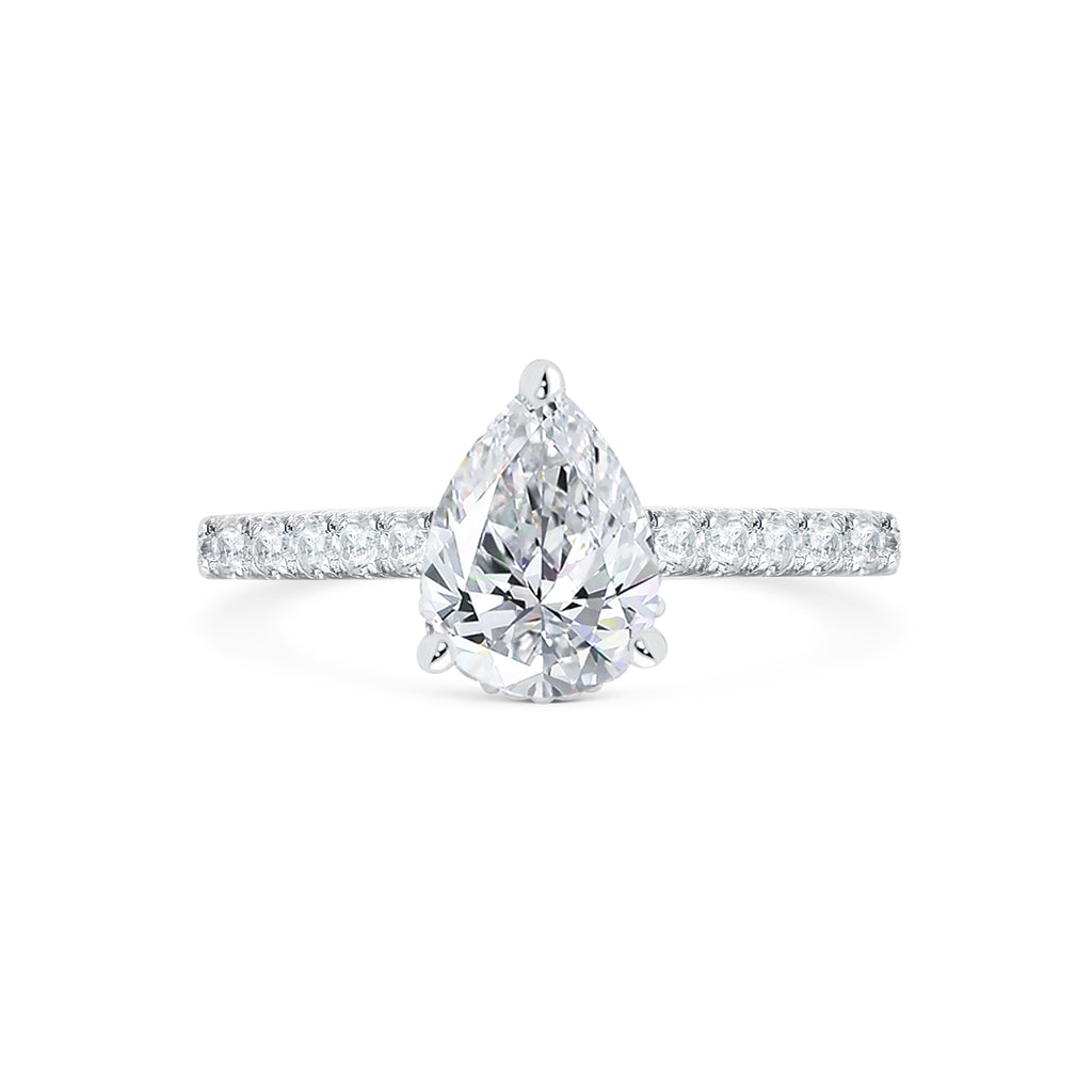 Pear or Tear drop diamond engagement ring with diamonds on band set in 18K white gold from Micheli Jewellery Melbourne