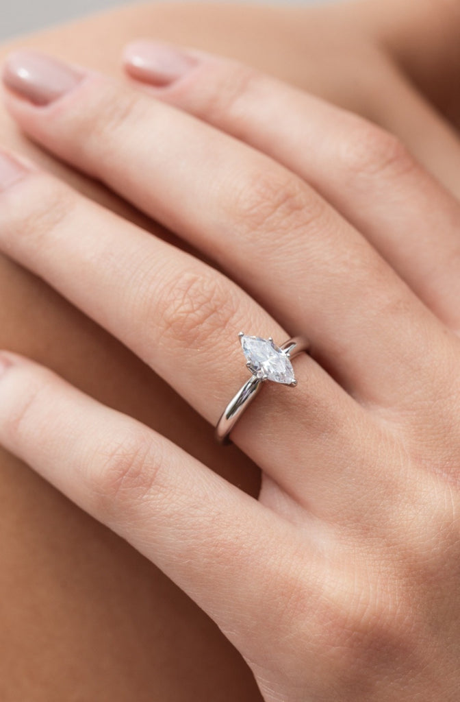 Martha - Micheli Jewellery, marquise diamond solitaire engagement ring in white gold. 6 claw engagement ring. white gold engagement ring. marquise diamond engagement ring modelled on hand. engagement ring on the hand. 
